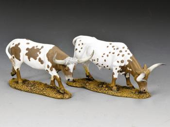 Texas Longhorns (Set #5)--two cattle figures (mostly white with brown patches and speckles) #9