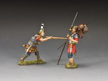 Image of "Inspection!"--single Centurion figure pokes single Legionary figure with his staff