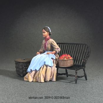 Image of “Emily Lost in Thought”--Young Woman Sitting on Bench--single seated figure, bench, & accessories