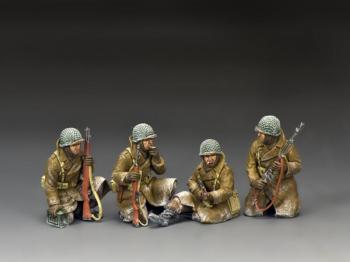 Image of Sitting, Smoking, & Waiting--four seated WWII American GI figures in overcoats