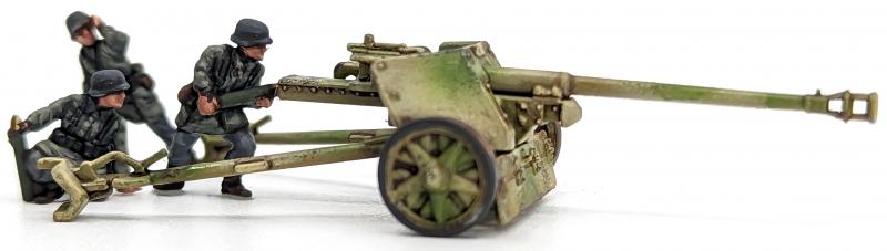 7.5cm Pak 40 and Sdkfz 11’s--four each of 1:144 scale halftracks and cannon (unpainted plastic kit) #3