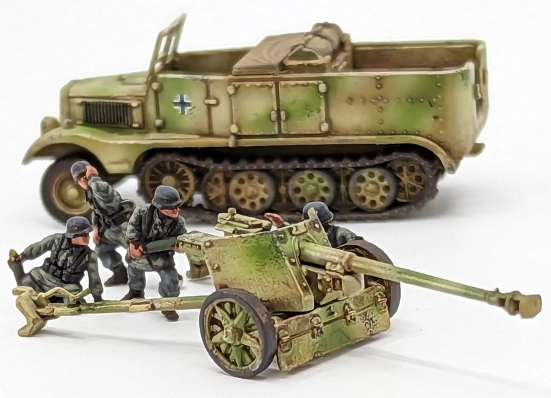 7.5cm Pak 40 and Sdkfz 11’s--four each of 1:144 scale halftracks and cannon (unpainted plastic kit) #4