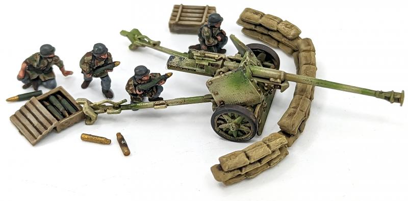 7.5cm Pak 40 and Sdkfz 11’s--four each of 1:144 scale halftracks and cannon (unpainted plastic kit) #10