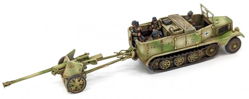 7.5cm Pak 40 and Sdkfz 11’s--four each of 1:144 scale halftracks and cannon (unpainted plastic kit) #16