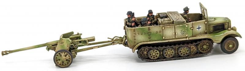 7.5cm Pak 40 and Sdkfz 11’s--four each of 1:144 scale halftracks and cannon (unpainted plastic kit) #17