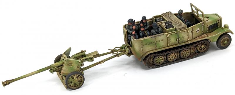 7.5cm Pak 40 and Sdkfz 11’s--four each of 1:144 scale halftracks and cannon (unpainted plastic kit) #18