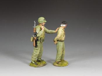 Image of What, Me Worry?--two standing Vietnam-era figures (USMC Grunt pushing blindfolded Vietnamese prisoner)