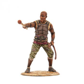 Image of African Doctores--single figure pointing with club