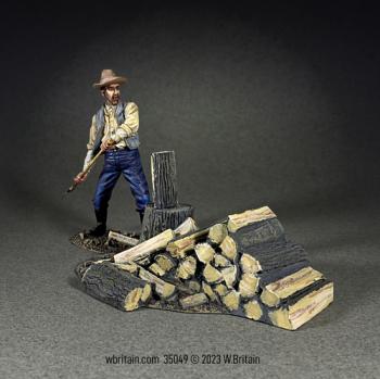 Image of “I Don’t Mind Chopping Wood”, Virgil Caine with Axe, 1855-65--single figure and stack of firewood