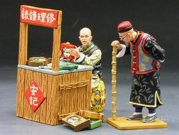 Image of Clock Repair Man & Stand with Customer--two figures and Stand