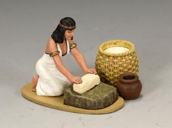 Image of The Breadmaker--Egyptian woman preparing dough--RETIRED.