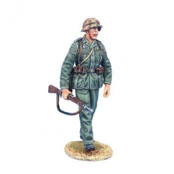 Image of German Soldier Walking with K98 and Helmet Cover--single figure