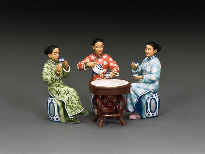 three seated figures