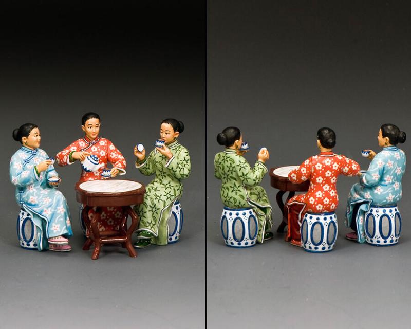 three seated figures