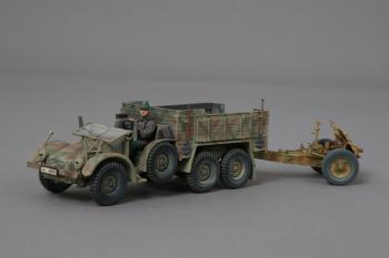 Image of Krupp Truck with SS driver looking forward and towable 7.5cm infantry gun--includes ammunition crates--driver wearing soft cap--RETIRED--LAST ONE!!